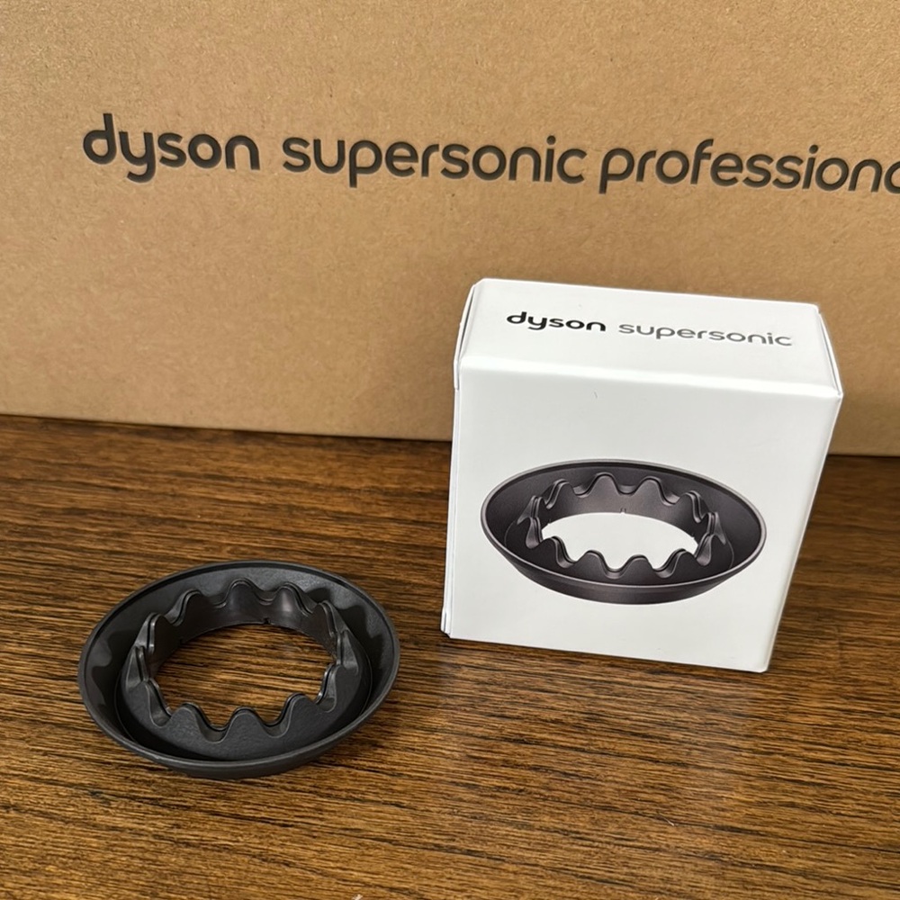 Dyson Charcoal Gray Supersonic Gentle air attachment.